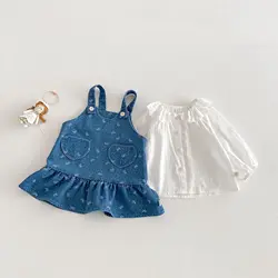 Vestido vaquero para niña con lazo y volantes