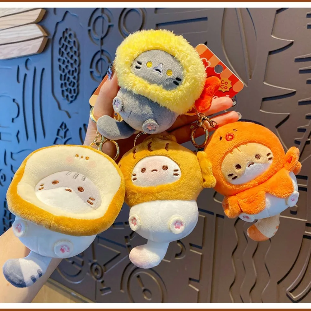 LLavero de peluche de gato de cacao, juego de cabeza de pargo, exquisito colgante de mochila escolar, colgante de muñeca suave japonesa