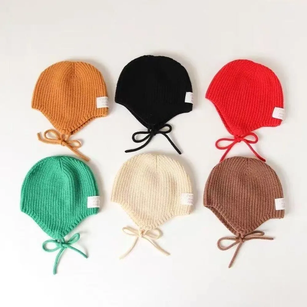 Conjunto bebé jersey de punto y gorro con protección auditiva - imagen 2