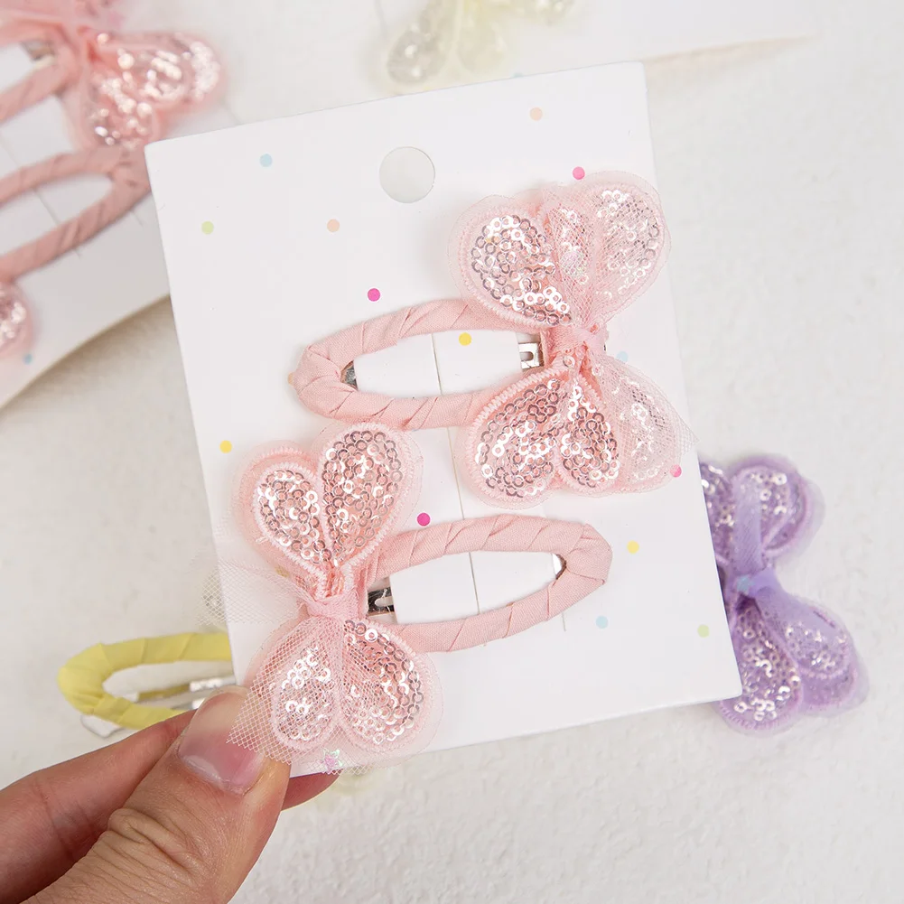 Pinzas de pelo con mariposa y lentejuelas para niña - imagen 4