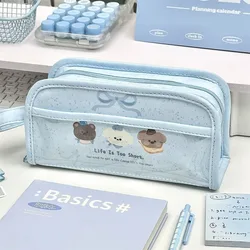 Estuche escolar con bolígrafos azules y lápices - dibujos animados