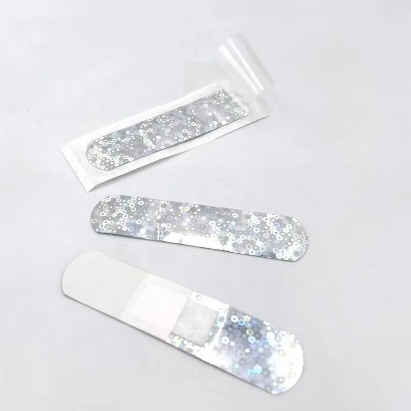 50 unids/set tirita de Color láser yesos de moda parche para vendaje de heridas para niños vendajes adhesivos impermeables cinta de primeros auxilios - imagen 4