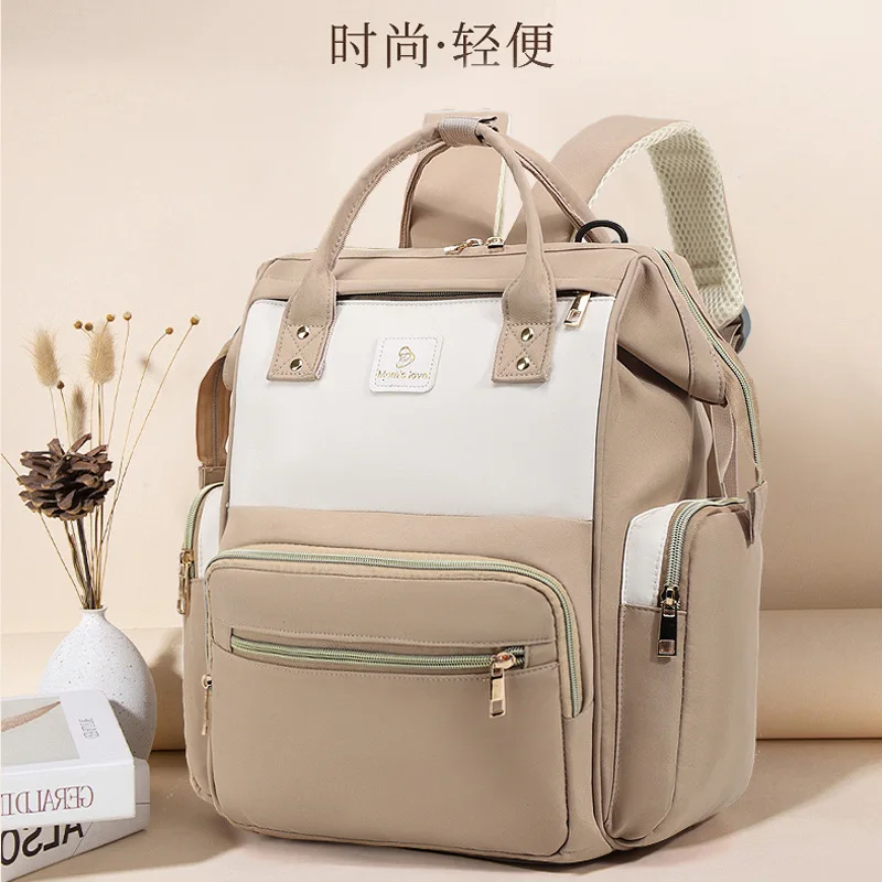 Bolsa de pañales impermeable con cambiador – Espaciosa y práctica - imagen 4