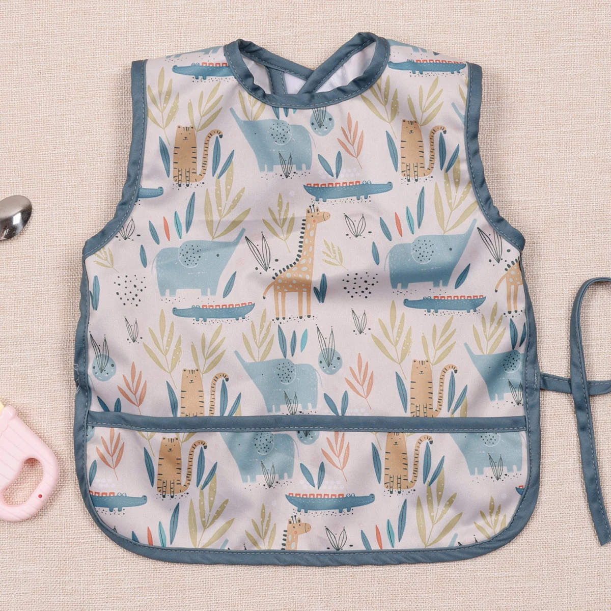 HappyFlute 1 pieza con bolsillo impermeable impresión sin mangas gancho y bucle + correa babero de alimentación de bebé fácil de limpiar