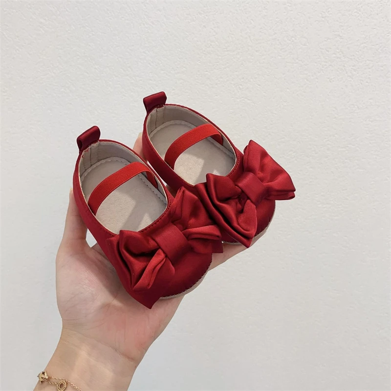 Zapatos para niñas, día de Navidad, zapatos rojos de princesa con lazo para niños, cómodos zapatos antideslizantes de suela blanda para niños pequeños, primeros zapatos para caminar