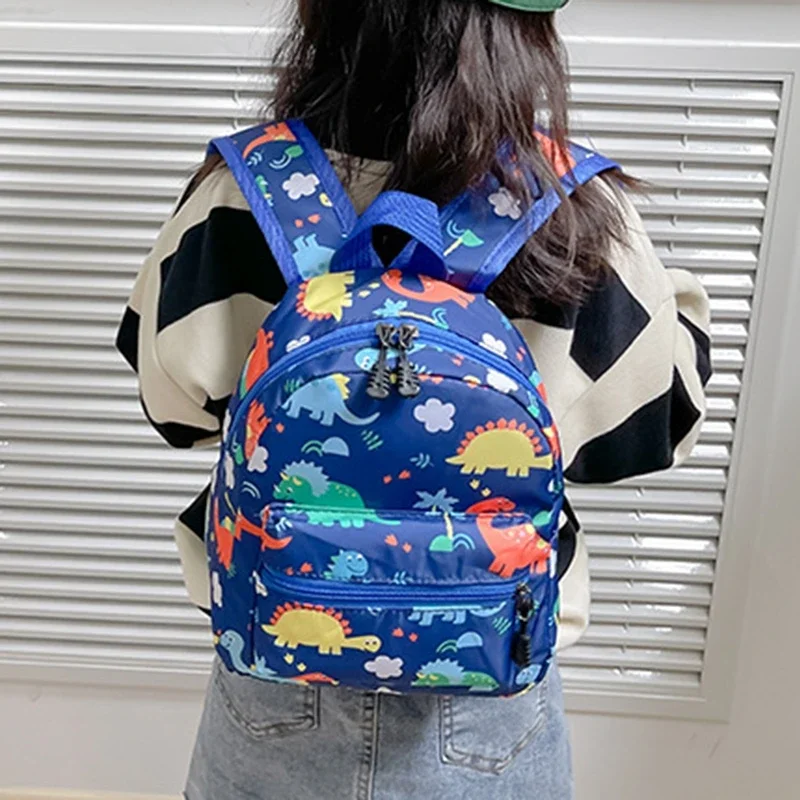 Mochila escolar infantil impermeable con unicornio y dinosaurio - imagen 2