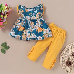 Conjunto veraniego niña con camiseta floral y leggings lisos
