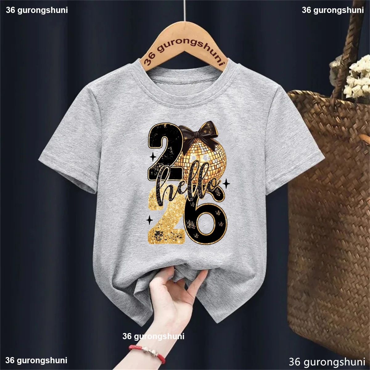 Camiseta con estampado de lazo rosa Golden Hello 2026 para niñas, camiseta de Feliz Año Nuevo, regalos de vacaciones, ropa Kawaii para niños, camiseta sólida - imagen 4