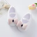White baby shoes