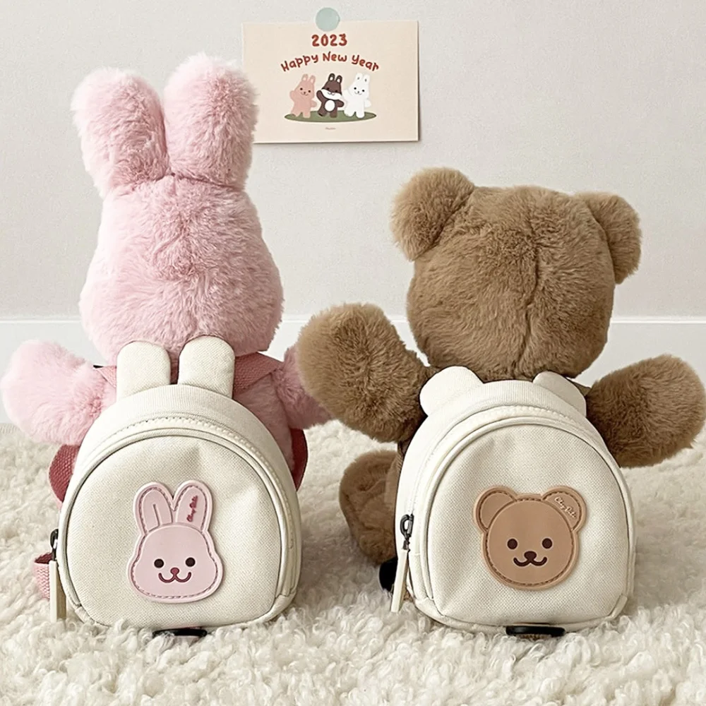 Mochila infantil en lona con arnés antipérdida y diseño animal