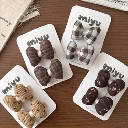 Clips de pelo lazo boho floral beige para niños