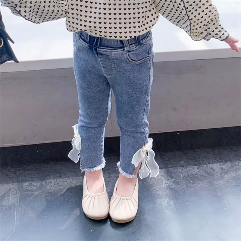Pantalones vaqueros rectos y sueltos para niña con nudo mariposa - imagen 2