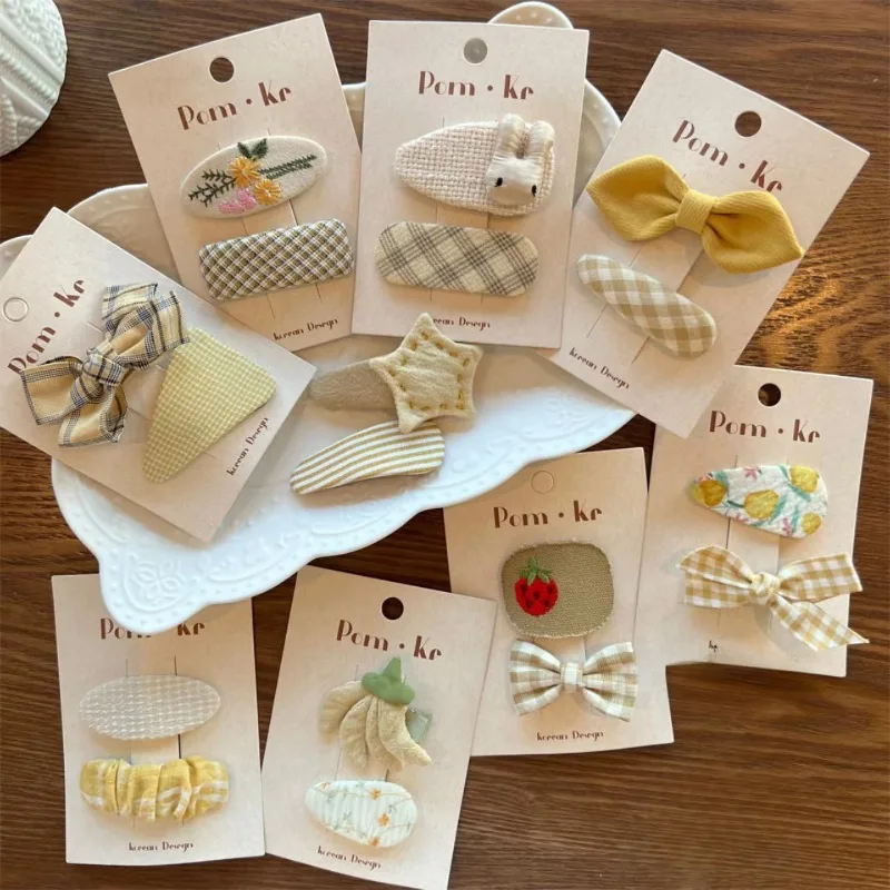 Clips de pelo para niña – Lazos suaves y versátiles - imagen 2