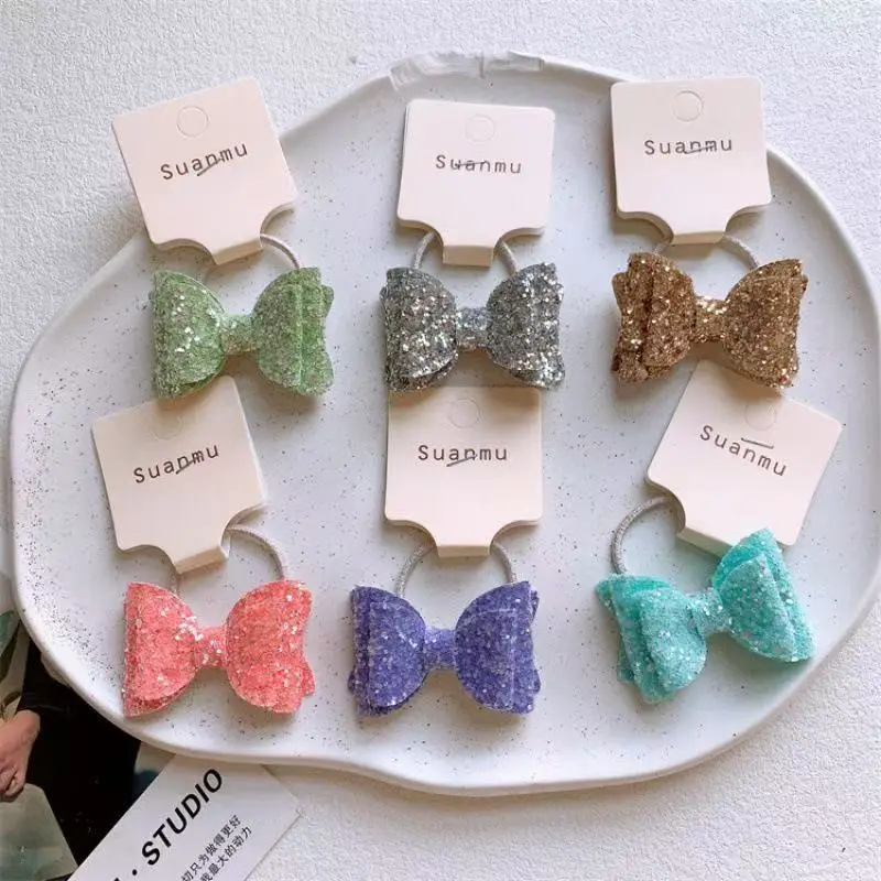 Lazos de lentejuelas y coleteros elásticos para niñas – Elegantes - imagen 2
