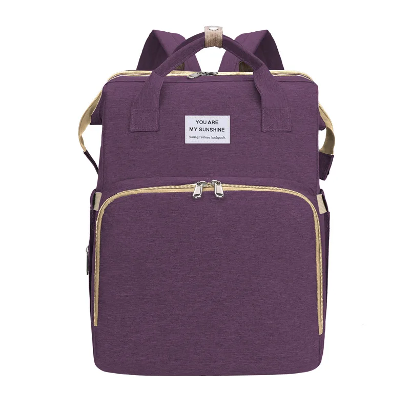 Mochila para pañales con cambiador de piel sintética para viaje