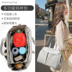 Bolso bandolera maternal de gran capacidad y estilo moderno