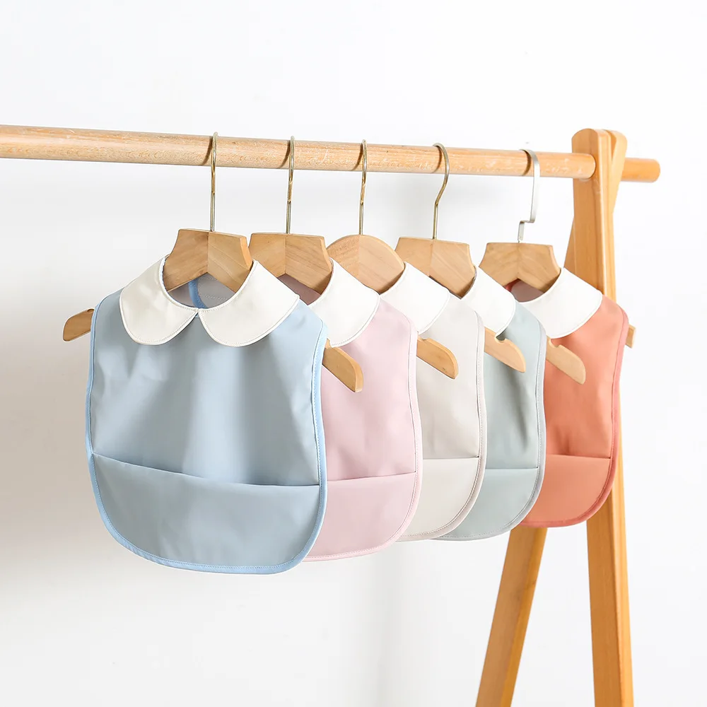 Nuevos Baberos impermeables para bebé, bonito paño sólido sin mangas, delantal de alimentación, babero, paño suave para eructar para niños pequeños, Baberos Bandana para niñas - imagen 2