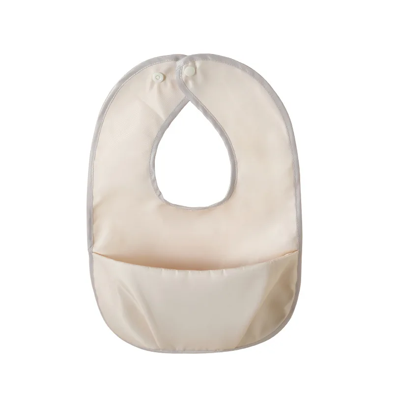 Babero impermeable de alimentación con recogedor suave
