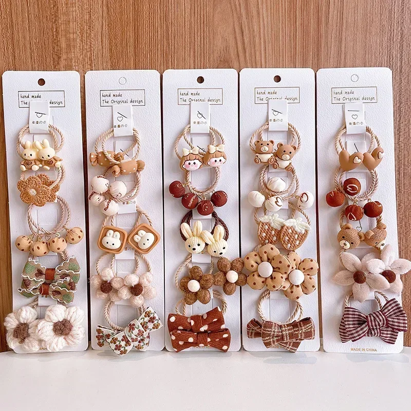 Lindo lazo de flores de dibujos animados niños pequeño Scrunchie bebé niña chico elástico de goma para el cabello accesorios corbata anillo para el cabello tocado de cuerda - imagen 2