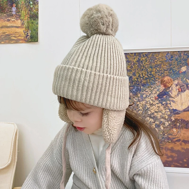 Gorro de invierno para bebé, gorro tejido con forro de felpa para niñas y niños, gorro con pompón grande, gorros con protección para los oídos, accesorios cálidos para niños de 2 a 6 años - imagen 3