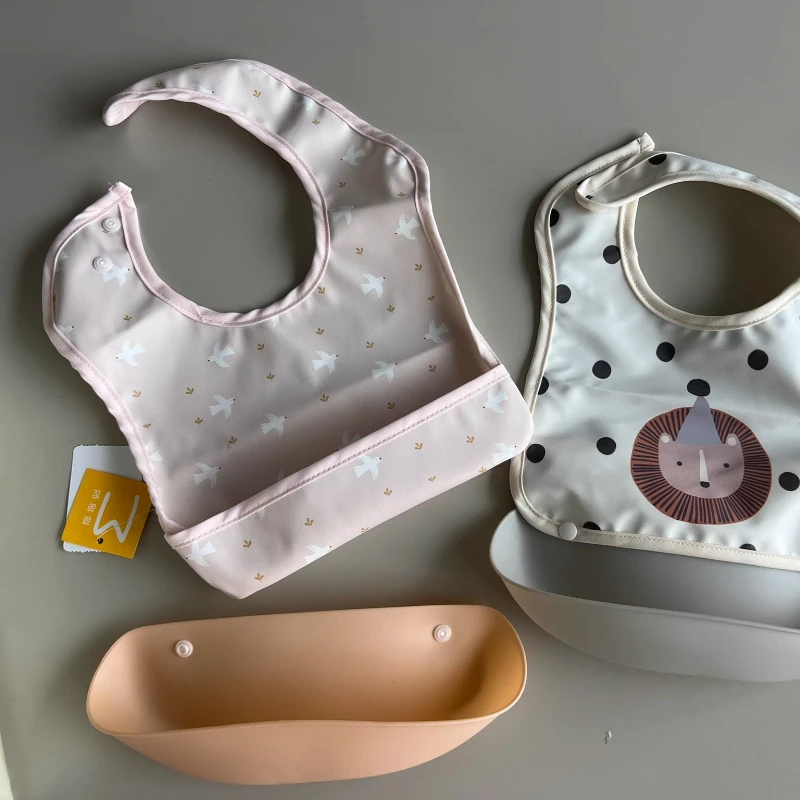 Babero de dibujos animados suave impermeable con bolsillo de arroz extraíble para bebé para comer niños y niñas babero de comida complementaria para bebé sin enjuague