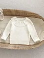 beige sweater