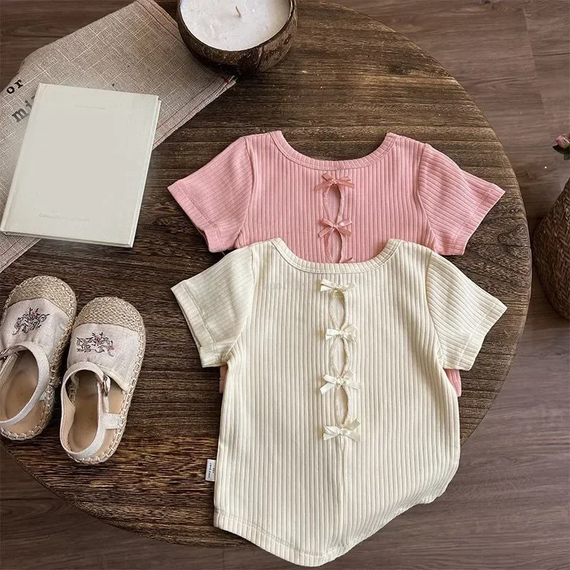 Camisetas de manga corta para niñas, novedad de verano 2021, camisetas de Edición coreana para niñas, pantalones cortos de princesa con lazo hueco en la espalda a la moda - imagen 4