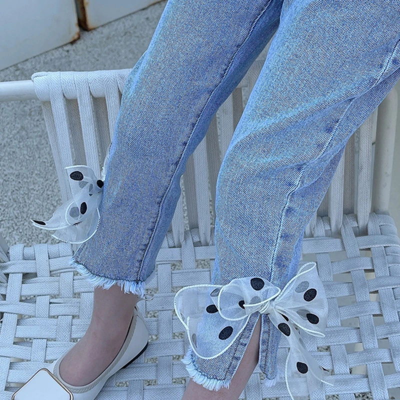 Pantalones vaqueros rectos y sueltos para niña con nudo mariposa - imagen 5