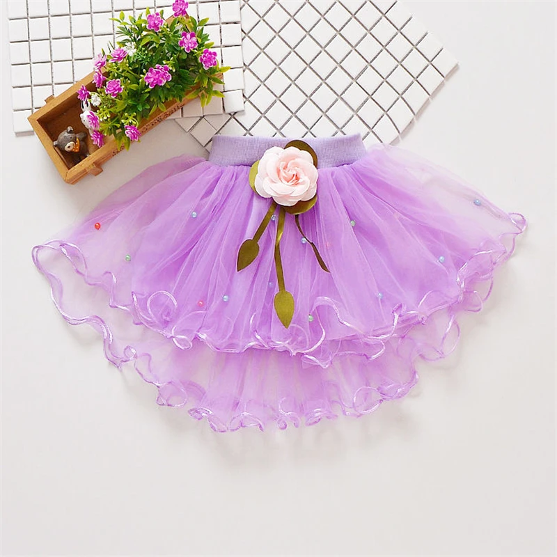 Falda de bebé con volantes de Color sólido, Falda corta de sabor extranjero para niños, colgante de flores, falda de estilo dulce y bonito de malla de verano para niñas - imagen 5