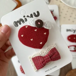 Pinza de pelo roja con lunares de tela y lazo para niñas