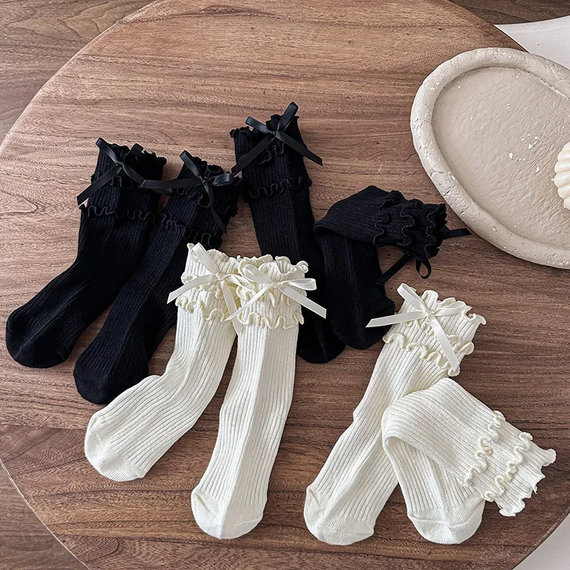 2 par/set de calcetines de algodón blanco crema estilo Lolita para niñas, calcetines de princesa con volantes de Triple capa y lazo coreano para niños pequeños y niños - imagen 2