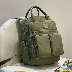 Bolsa de pañales impermeable con bolsillos y porta biberones