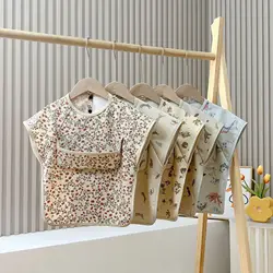 Babero impermeable para bebé con animalitos