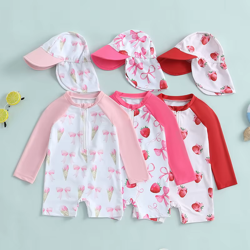 Bañador UV Tregren manga larga con gorro fresa para niños