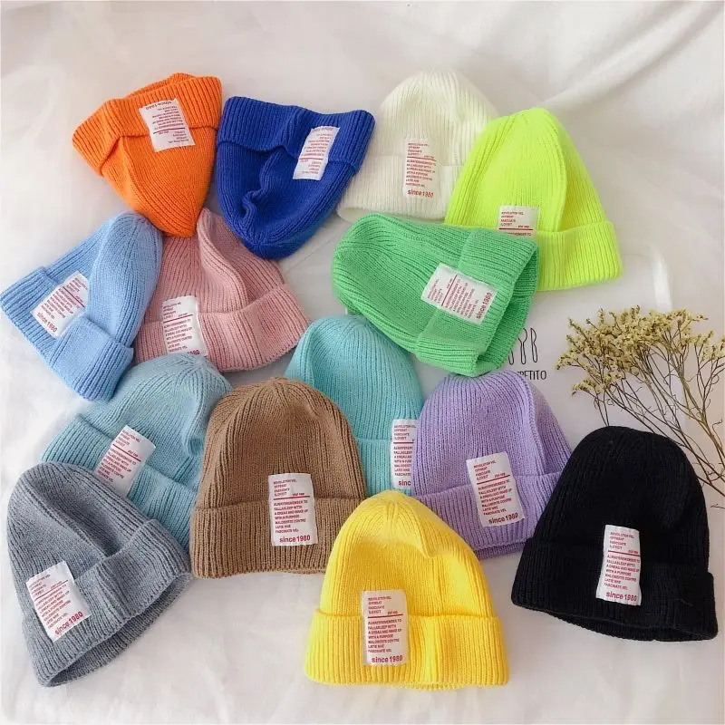 Gorro elástico infantil en tonos neutros