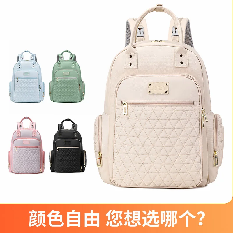 Bolsa de pañales impermeable con cambiador amplio y organizada