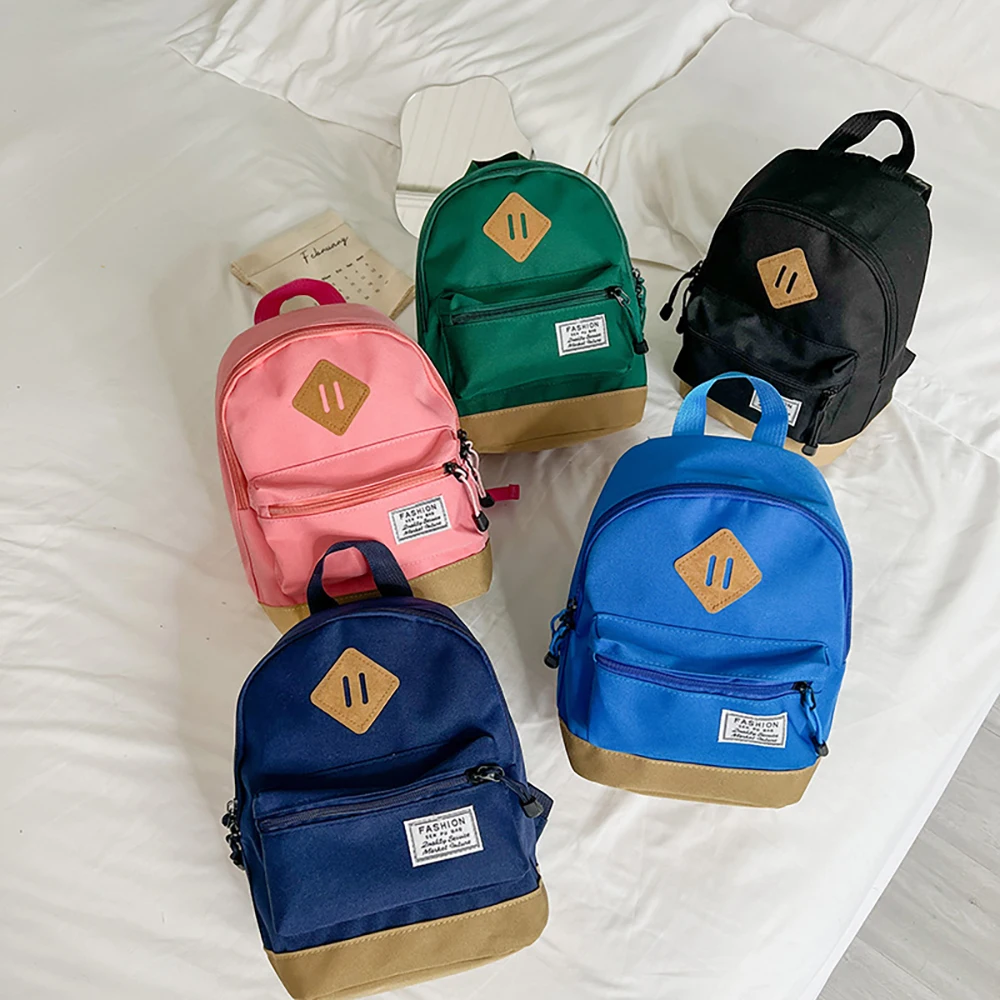 Mochila infantil de lona resistente con colores vivos