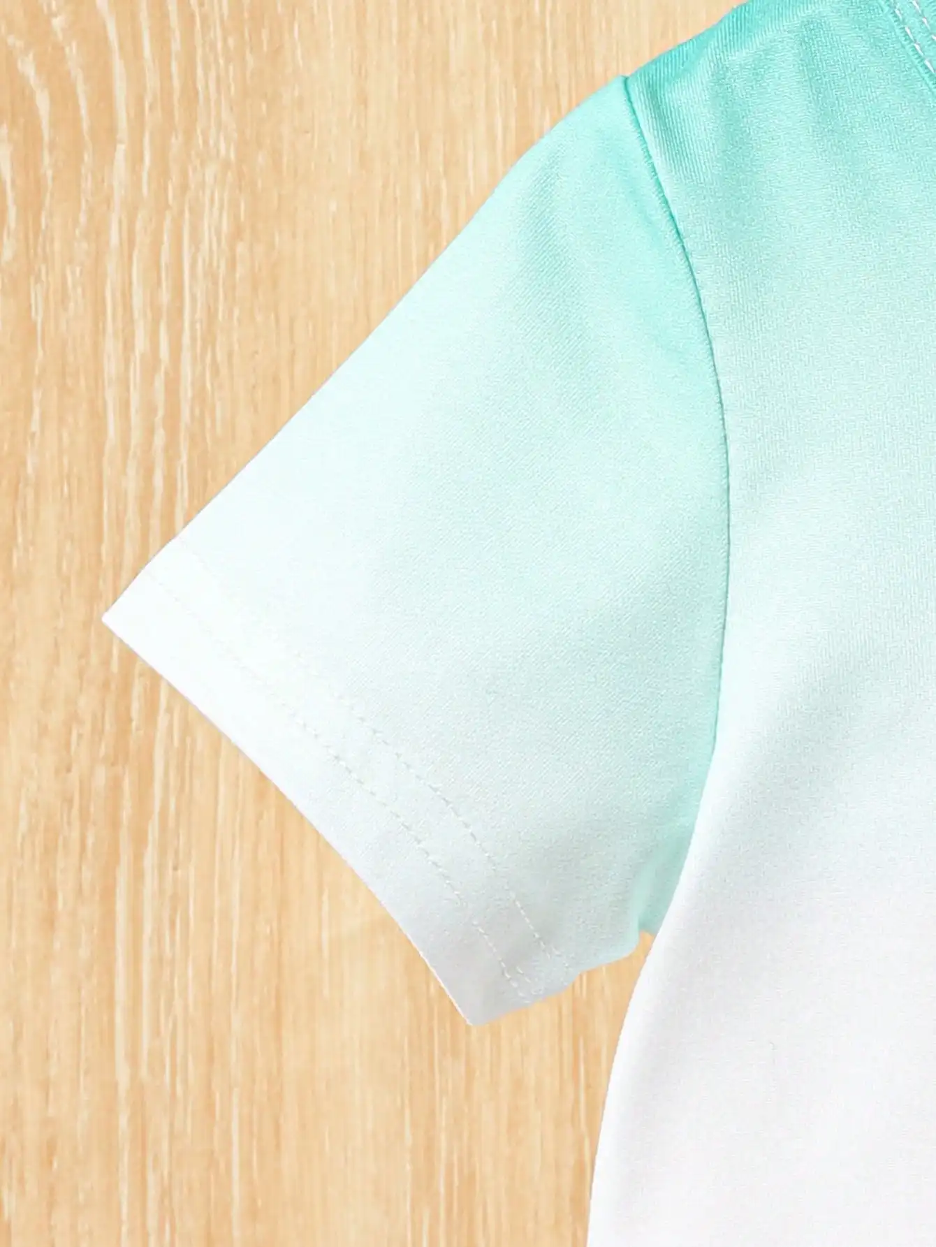 Camiseta manga corta bebé degradé tropical de verano