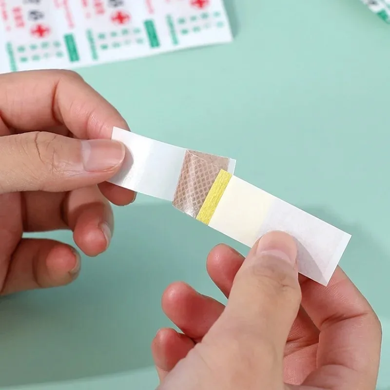 50 Uds tirita de yeso transpirable tiras de primeros auxilios parche de vendaje para heridas para el cuidado de la piel vendajes adhesivos Woundplast - imagen 2
