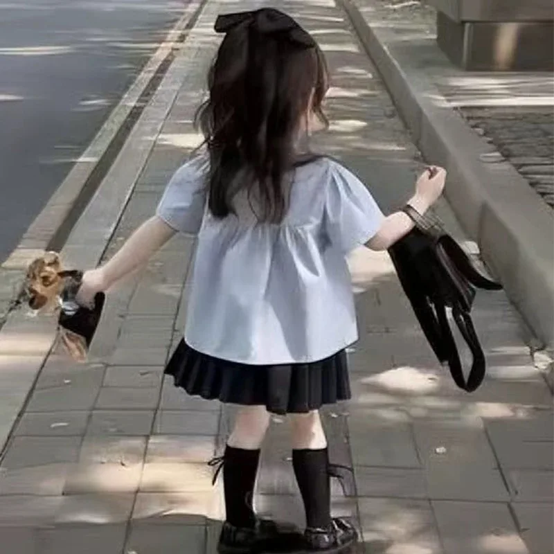 2025 Conjunto de falda plisada de Color sólido de estilo universitario para niñas de primavera y verano, camisa de manga corta de verano, conjunto de dos piezas con estilo - imagen 5
