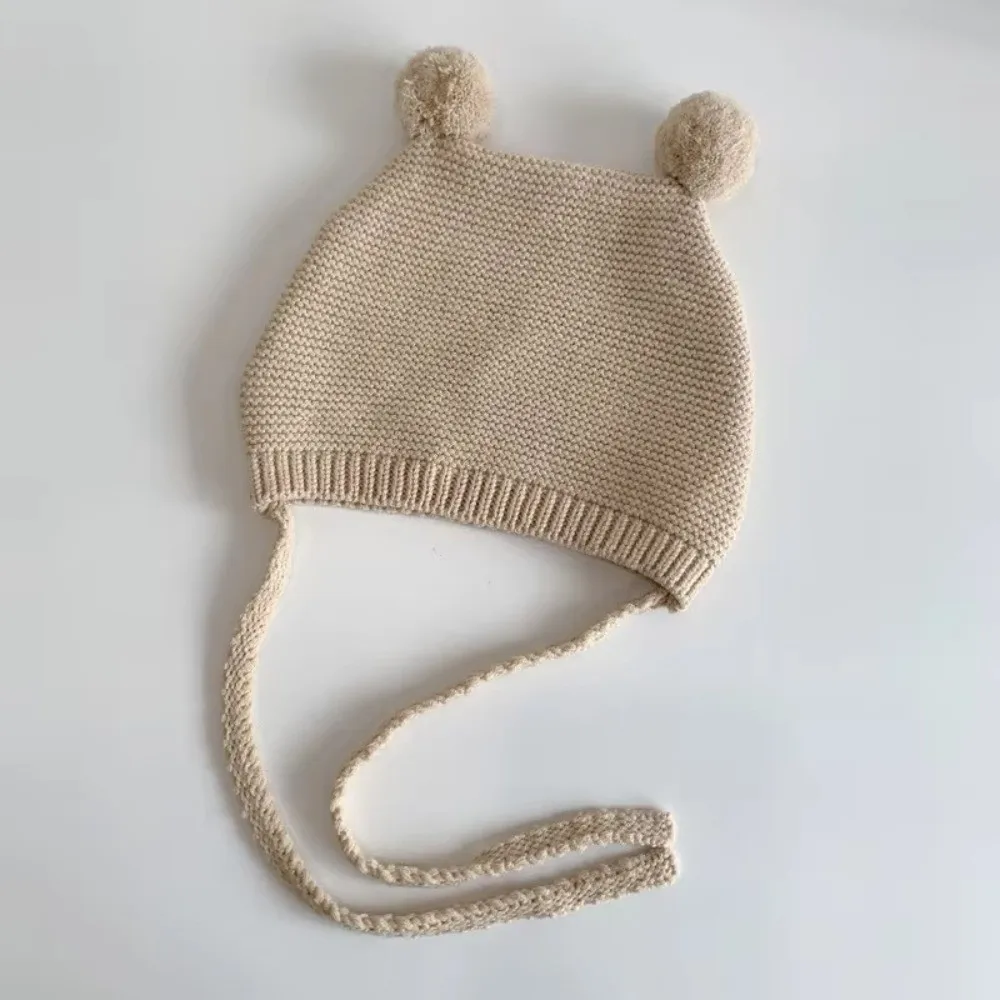 Nuevo Gorro coreano con protección para los oídos, gorro tejido cálido para invierno de 2 a 24 meses para niños pequeños, gorro infantil de ganchillo de lana con doble bola - imagen 4