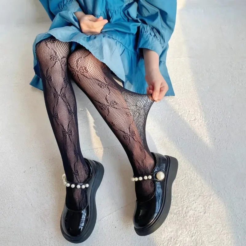 Medias de malla huecas con lazo para niños, medias de rejilla de moda dulce, calcetines finos suaves y transpirables para niñas, pantimedias blancas de verano - imagen 2