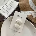 Pasador de pelo beige
