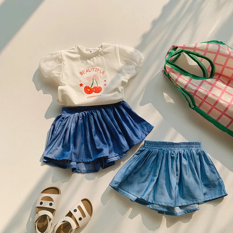 Pantalones cortos para niñas, faldas informales de verano, pantalones cortos plisados con cintura elástica para niños, ropa de Color sólido, pantalones Kawaii para niños - imagen 2