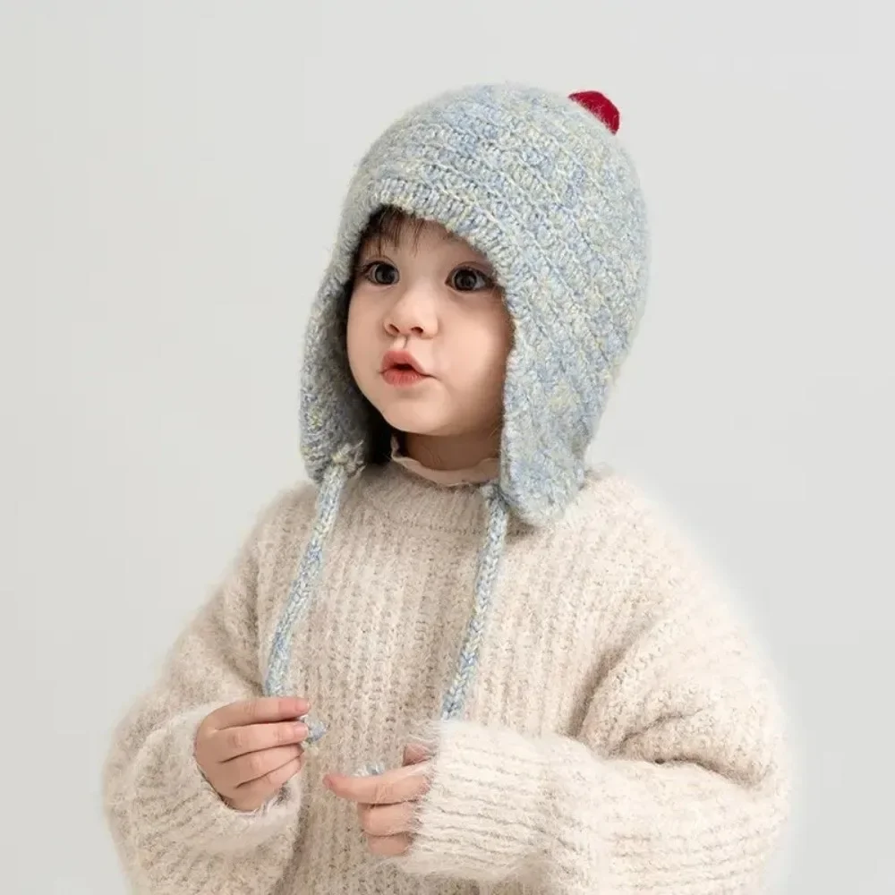 Gorro tejido a la moda para niños pequeños, protección para los oídos, gorros a prueba de viento para niños, gorro con orejeras de ocio para mantener el calor para niño y niña - imagen 3