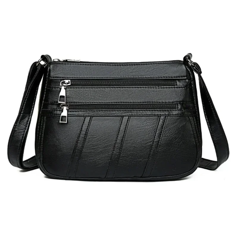 Bolso bandolera maternal de cuero suave con compartimentos - imagen 2
