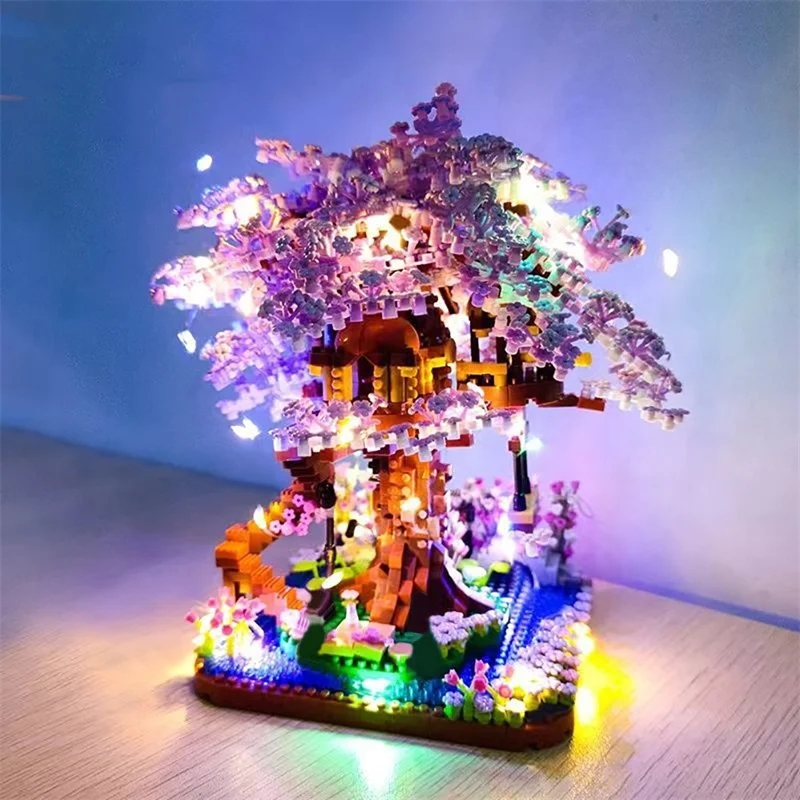Casa de árbol de flores con bloques de construcción y luces - imagen 2