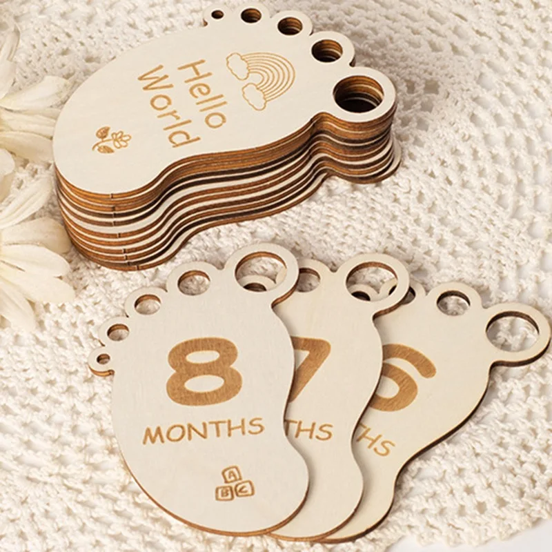 Tablero de madera con huella de nacimiento para fotografía bebé