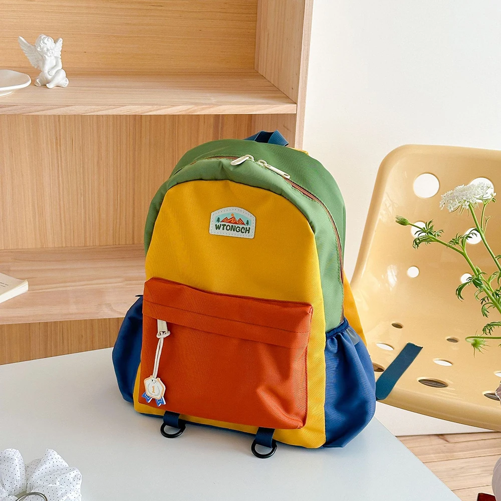 Mochila escolar infantil de bloques de color ligera y resistente