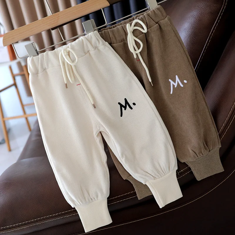M Beige